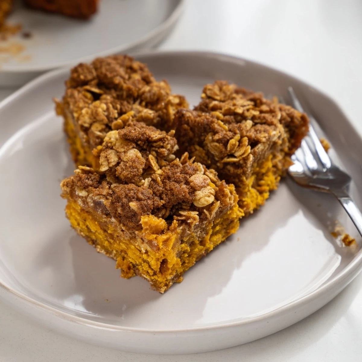 Deliciously spiced pumpkin bars with a crispy cornflake topping, ideal for breakfast.