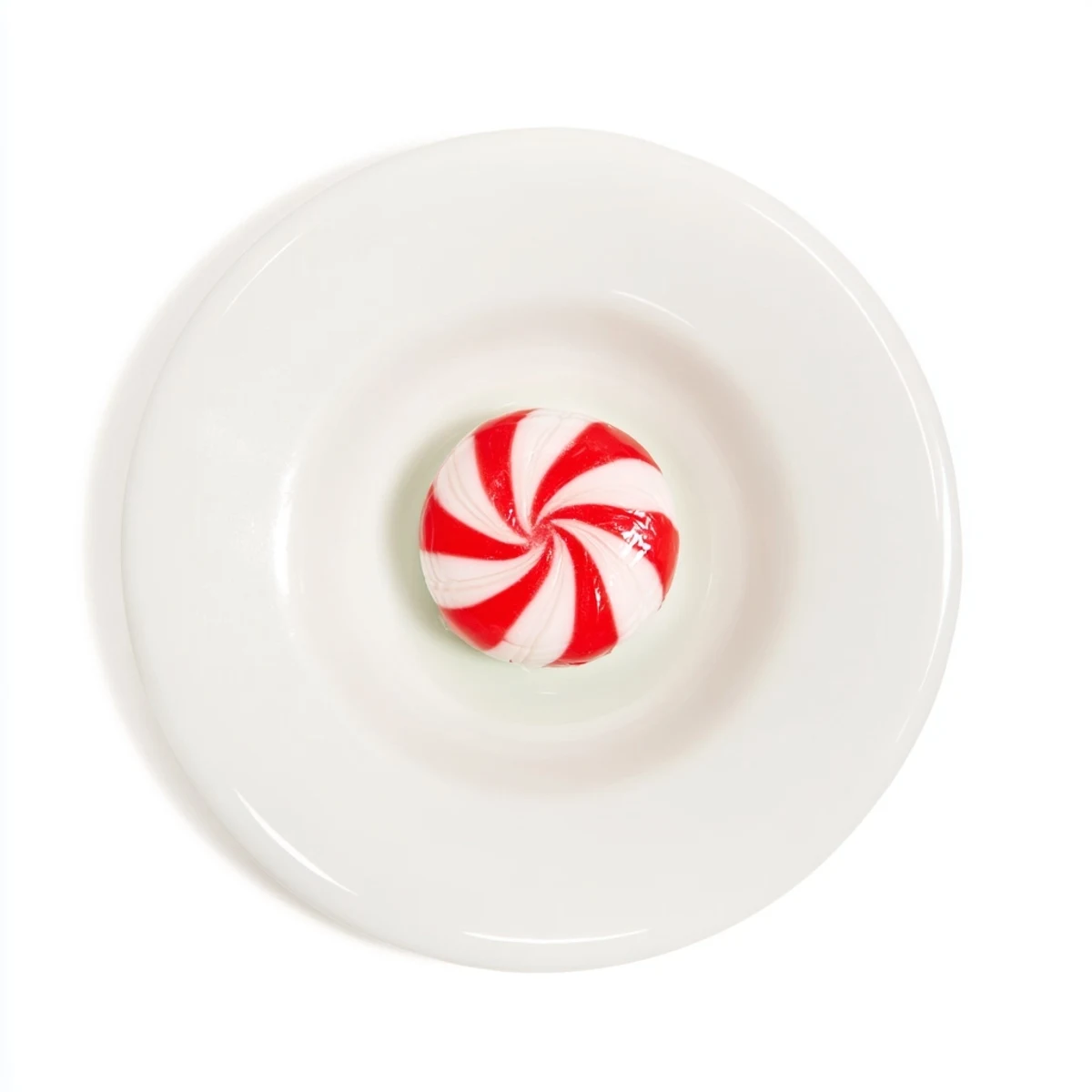 Shiny, clear No-Bake Peppermint Candy Bowl, beautifully shaped and perfect for holiday entertaining needs.