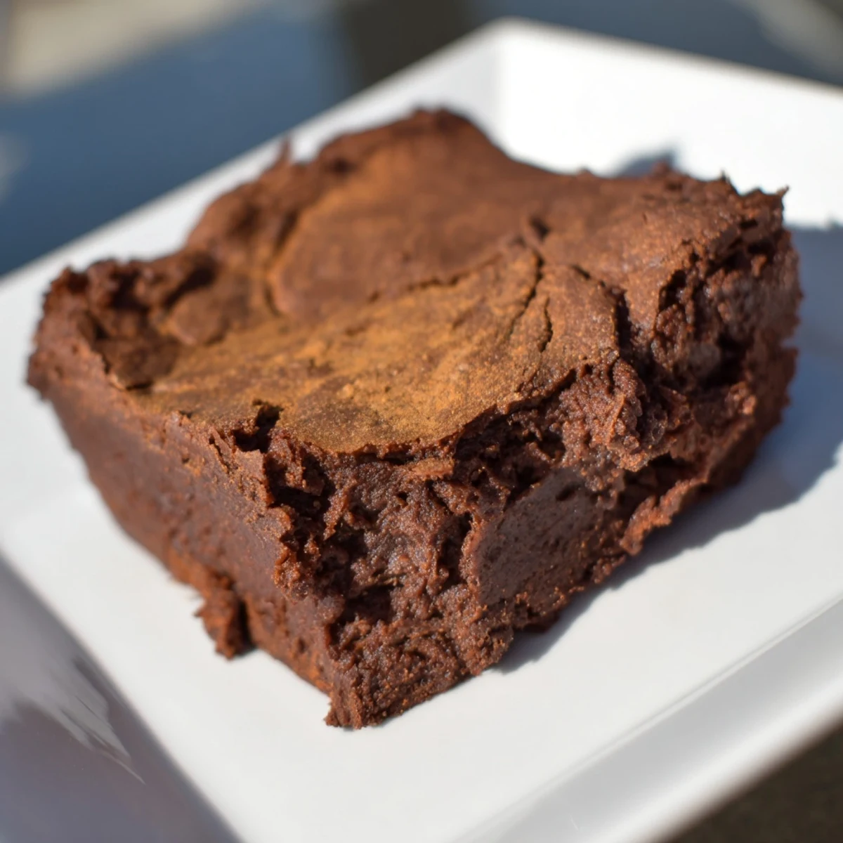 Perfectly fudgy Pumpkin Workout Brownies, a delicious treat offering a boost of healthy protein.