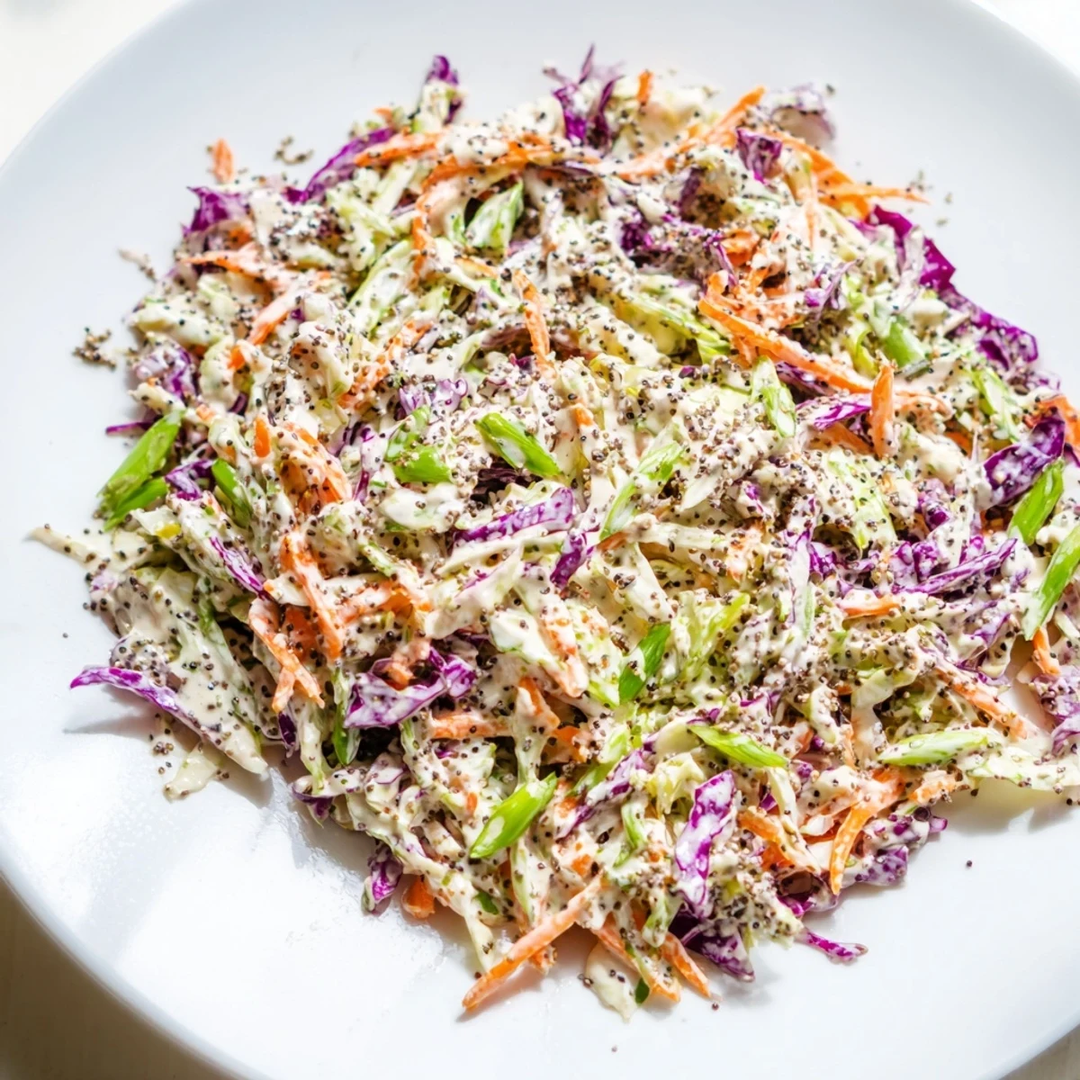 Creamy, vibrant Quick Coleslaw Salad — a colorful mix of shredded cabbage and tangy dressing.