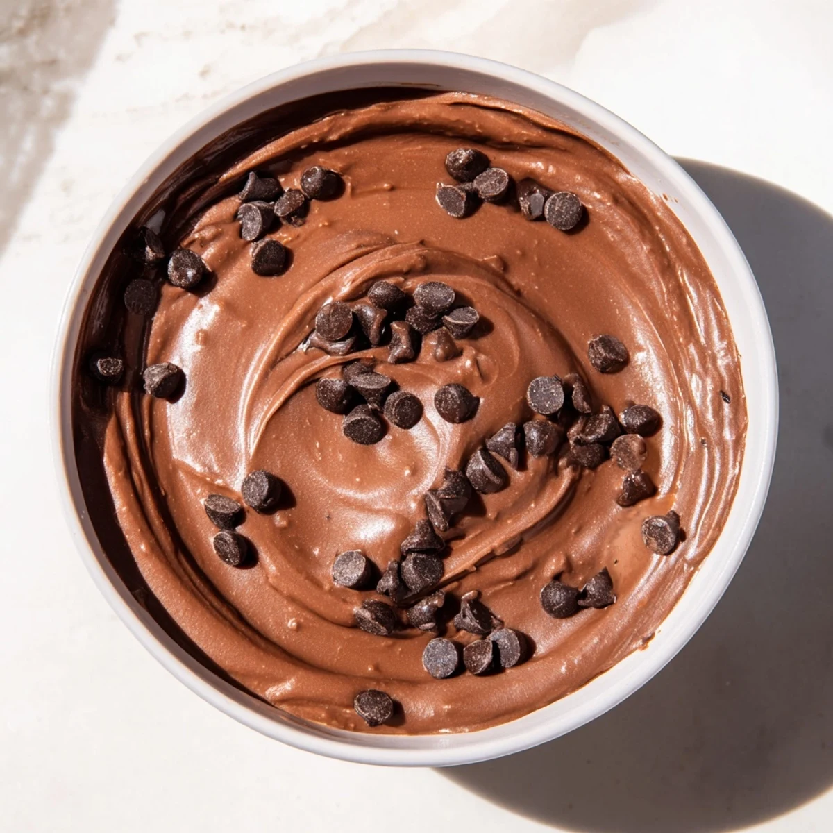 Close-up of decadent, homemade chocolate hummus, perfect for a guilt-free sweet treat.