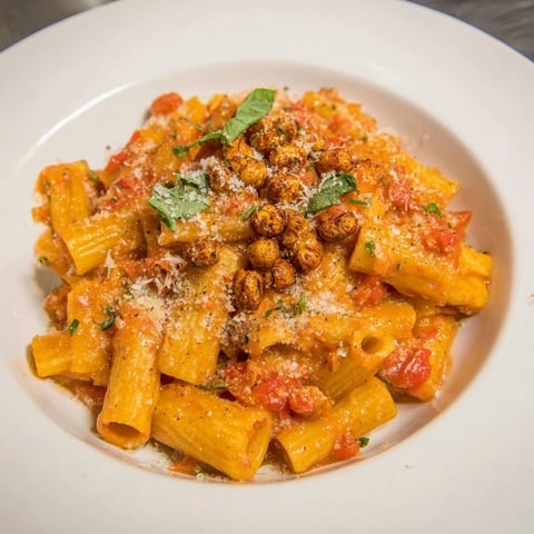 Spicy Arrabbiata Roasted Chickpea Crunch Pasta, a vibrant dish with crispy chickpeas and a fiery sauce.