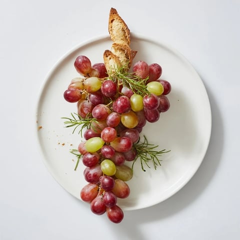 Fresh, juicy vineyard grapes arranged in a beautiful cascading design, ready for a party.