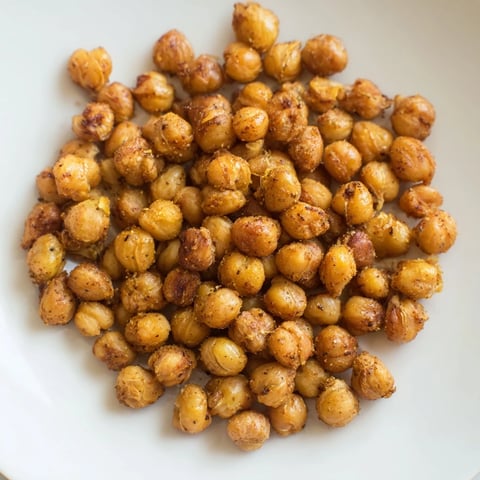 Golden-brown crispy chickpea snack, perfectly seasoned and ready for a satisfying, healthy treat.
