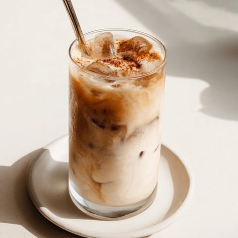 Creamy, blended Proffee Power Blend iced latte: a rich beverage with hints of vanilla and chocolate.