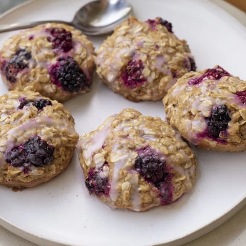 Homemade Protein Mixed Berry Muffin Tops cooling, a healthy and colorful grab-and-go breakfast.