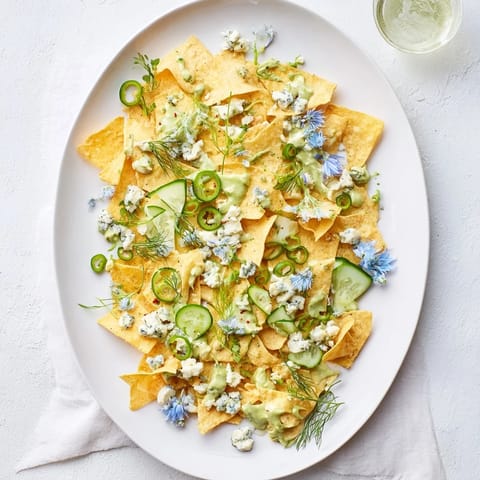 Visually stunning "Deep Sea Ocean Wave," a party-ready platter featuring swirling green and blue foods, creating ocean vibes.