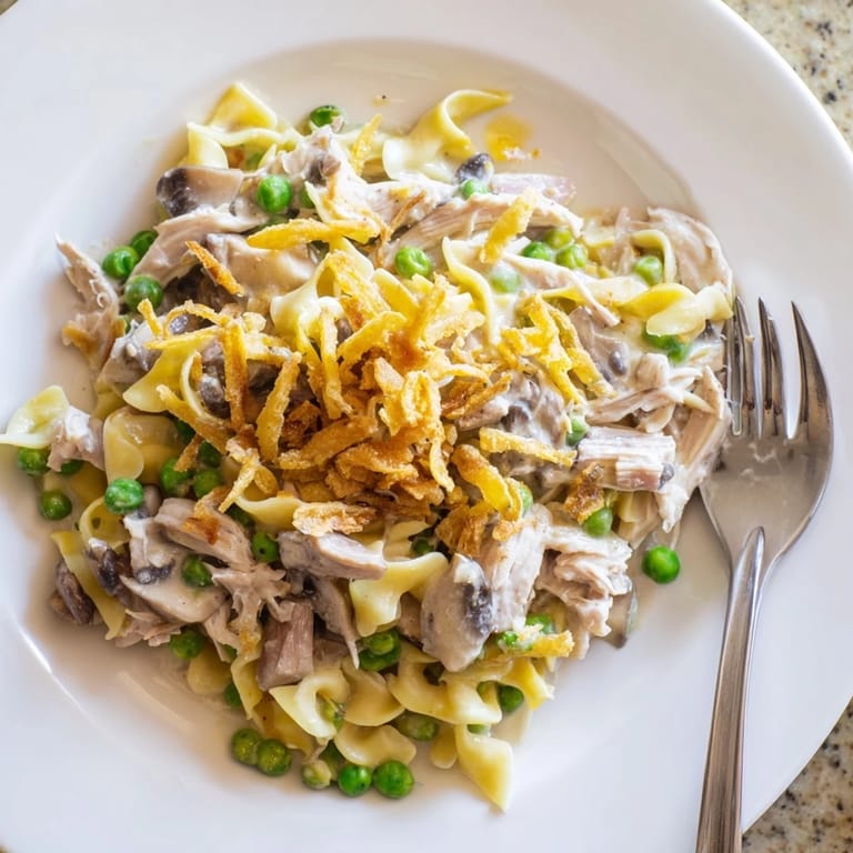 Serving suggestion: Ready-to-eat Tuna Noodle Casserole, topped with crispy onion rings.