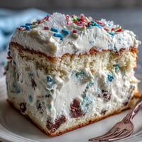 Decadent Spring Birthday Party Funfetti Dip Cake, bursting with colorful sprinkles and rich frosting.